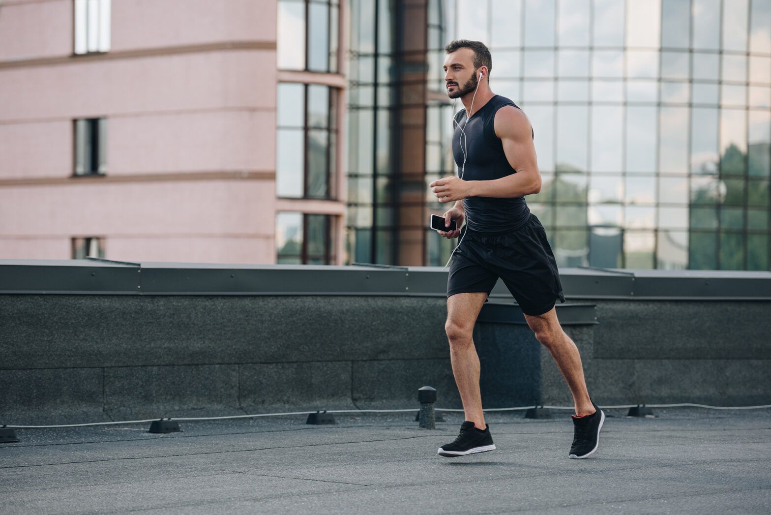 Young man walking with confidence 